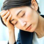 疲れを感じる妊婦さん