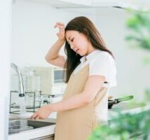 疲れを感じている妊婦さん